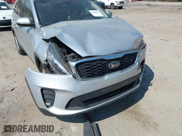 ✅ 2019 Kia Sorento LX • VIN: 5XYPG4A35KG506771 • Lot: 44704556. Wystawiony na IAAI z przebiegiem 125 000 mil. Bezpłatny archiwum sprzedaży aukcyjnych z USA i szczegółowy raport historii pojazdu na DreamBid. Zdjęcie 6.