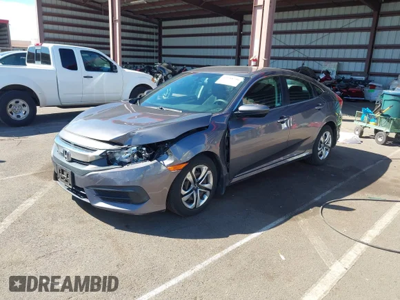 ✅ 2018 Honda Civic LX • VIN: 2HGFC2F53JH567883 • Lot: 43588746. Listed on IAAI with 49,854 mi. Free auction sales archive from the USA and detailed vehicle history report at DreamBid. Image 2.