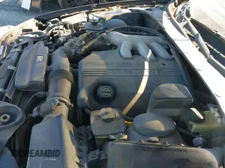 ✅ 2002 Lincoln LS w/Base Pkg • VIN: 1LNHM86S02Y704603 • Lot: 43575664. Wystawiony na IAAI z przebiegiem 193 357 mil. Bezpłatny archiwum sprzedaży aukcyjnych z USA i szczegółowy raport historii pojazdu na DreamBid. Zdjęcie 19.