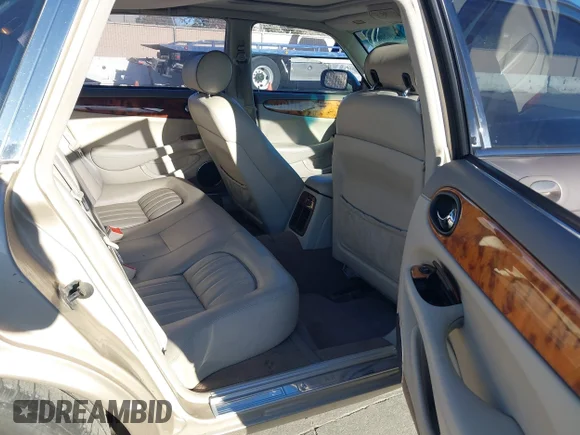 ✅ 2003 Jaguar XJ 8 • VIN: SAJDA14C63LF55325 • Lot: 44020652. Listed on IAAI with 142,106 mi. Free auction sales archive from the USA and detailed vehicle history report at DreamBid. Image 8.