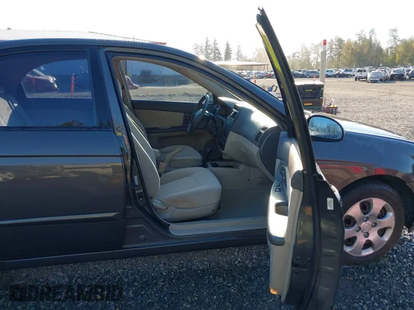 ✅ 2006 Kia Spectra EX • VIN: KNAFE121065306602 • Лот: 43239586. Опубликован ранее на IAAI с пробегом 152 907 миль. Бесплатный доступ к архиву аукционных продаж из США и подробный отчёт об истории автомобиля на DreamBid. Изображение 5.