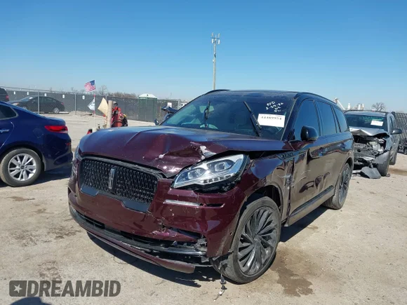 ✅ 2023 Lincoln Aviator Black Label • VIN: 5LM5J9XC3PGL21502 • Лот: 44489954. Опубликован ранее на IAAI с пробегом 26 371 миль. Бесплатный доступ к архиву аукционных продаж из США и подробный отчёт об истории автомобиля на DreamBid. Изображение 2.
