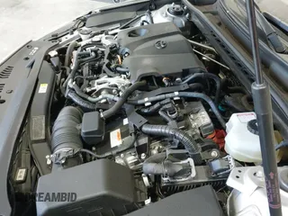 2020 Toyota Camry Hybrid LE with VIN 4T1E31AK5LU533523, listed as a IAAI auction lot 42002185 with 54,289 mi miles and . Bid and sale history available at DreamBid. Image 19.