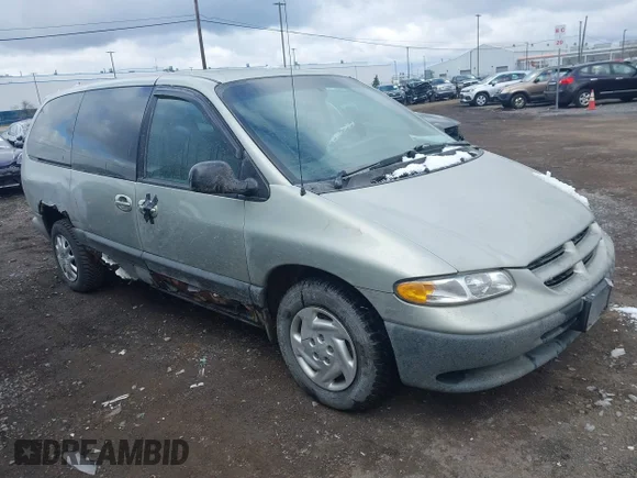 ✅ 1999 Dodge Caravan SE • VIN: 1B4GP44R4XB854348 • Lot: 41871640. Listed on IAAI with 169,312 mi. Free auction sales archive from the USA and detailed vehicle history report at DreamBid. Image 1.