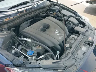 ✅ 2014 Mazda 3 S Touring • VIN: JM1BM1V38E1168265 • Lot: 42254818. Listed on IAAI with 100,639 mi. Free auction sales archive from the USA and detailed vehicle history report at DreamBid. Image 21.