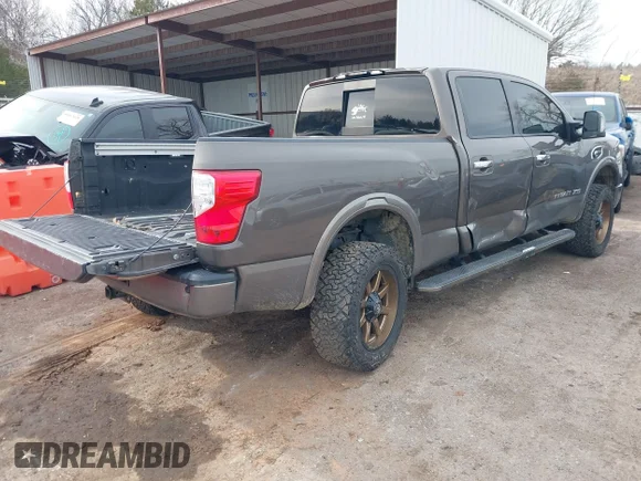 ✅ 2016 Nissan Titan Pro-4X • VIN: 1N6BA1F47GN504416 • Lot: 41223650. Wystawiony na IAAI z przebiegiem 168 440 mil. Bezpłatny archiwum sprzedaży aukcyjnych z USA i szczegółowy raport historii pojazdu na DreamBid. Zdjęcie 4.