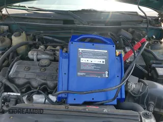 ✅ 1994 Ford Escort • VIN: 1FARP11J7RW270259 • Lot: 42341647. Listed on IAAI with 74,472 mi. Free auction sales archive from the USA and detailed vehicle history report at DreamBid. Image 12.