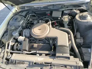 ✅ 1987 Cadillac DeVille • VIN: 1G6CD118XH4336337 • Лот: 86147724. Опубликован ранее на Copart с пробегом 121 598 миль. Бесплатный доступ к архиву аукционных продаж из США и подробный отчёт об истории автомобиля на DreamBid. Изображение 13.