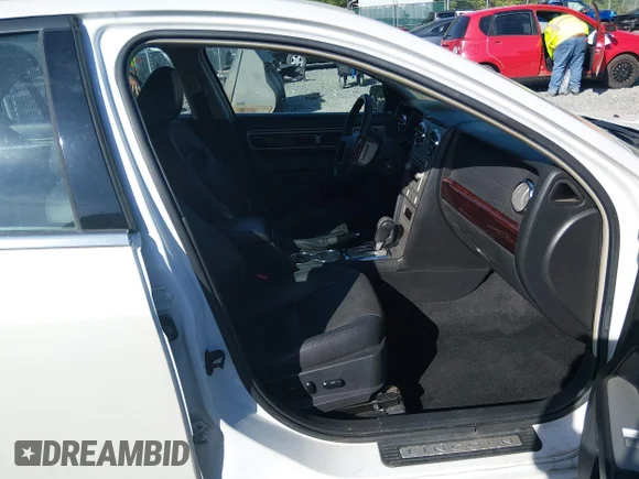 ✅ 2009 Lincoln MKZ • VIN: 3LNHM26T99R634551 • Lot: 45143074. Listed on IAAI with 1,745,331 mi. Free auction sales archive from the USA and detailed vehicle history report at DreamBid. Image 5.