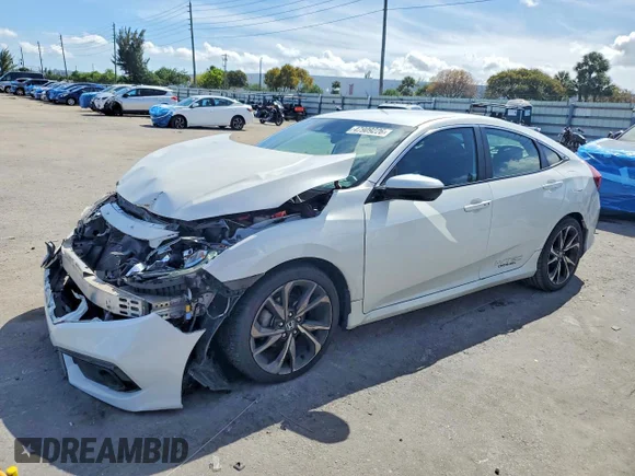 ✅ 2019 Honda Civic Sport • VIN: 19XFC2E87KE009140 • Лот: 47909226. Опубликован ранее на Copart с пробегом 63 243 миль. Бесплатный доступ к архиву аукционных продаж из США и подробный отчёт об истории автомобиля на DreamBid. Изображение 1.
