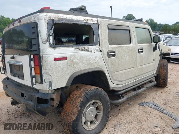 ✅ 2003 Hummer H2 • VIN: 5GRGN23UX3H127837 • Lot: 39721105. Wystawiony na IAAI z przebiegiem 364 643 mil. Bezpłatny archiwum sprzedaży aukcyjnych z USA i szczegółowy raport historii pojazdu na DreamBid. Zdjęcie 4.
