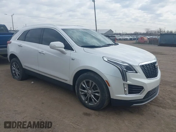 ✅ 2023 Cadillac XT5 AWD Premium Luxury • VIN: 1GYKNDRSXPZ169951 • Лот: 44619028. Опубликован ранее на IAAI с пробегом 72 833 миль. Бесплатный доступ к архиву аукционных продаж из США и подробный отчёт об истории автомобиля на DreamBid. Изображение 1.