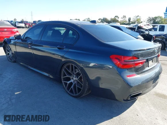 ✅ 2017 BMW 7 Series 740i • VIN: WBA7E2C5XHG739749 • Лот: 44238699. Опубліковано раніше на IAAI з пробігом 90 695 миль. Безкоштовний доступ до архіву аукціонних продажів зі США та докладний звіт про історію автомобіля на DreamBid. Зображення 3.