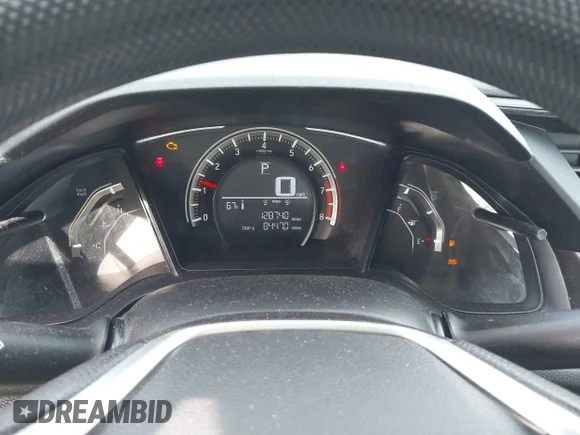 ✅ 2018 Honda Civic LX • VIN: 19XFC2F58JE206840 • Lot: 44560015. Wystawiony na IAAI z przebiegiem 128 740 mil. Bezpłatny archiwum sprzedaży aukcyjnych z USA i szczegółowy raport historii pojazdu na DreamBid. Zdjęcie 7.