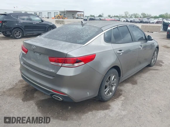 ✅ 2016 Kia Optima LX Turbo • VIN: 5XXGT4L16GG027844 • Lot: 44703534. Listed on IAAI with 124,493 mi. Free auction sales archive from the USA and detailed vehicle history report at DreamBid. Image 4.