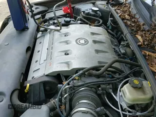 ✅ 2003 Cadillac DeVille DHS • VIN: 1G6KE54Y53U244301 • Lot: 42831032. Listed on IAAI with 98,534 mi. Free auction sales archive from the USA and detailed vehicle history report at DreamBid. Image 15.