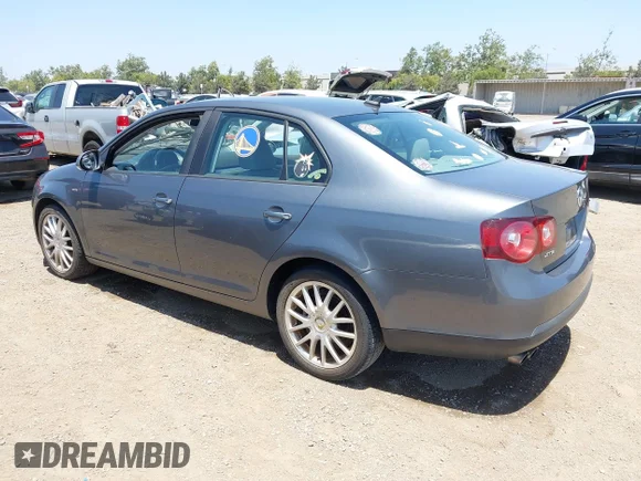 ✅ 2009 Volkswagen Jetta Wolfsburg Edition • VIN: 3VWRA71K59M047447 • Lot: 45287137. Wystawiony na IAAI z przebiegiem 76 673 mil. Bezpłatny archiwum sprzedaży aukcyjnych z USA i szczegółowy raport historii pojazdu na DreamBid. Zdjęcie 3.