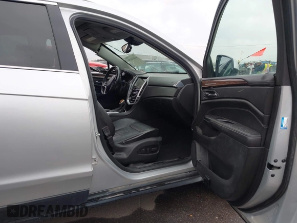 ✅ 2013 Cadillac SRX Premium Collection • VIN: 3GYFNJE37DS647587 • Lot: 44416650. Wystawiony na IAAI z przebiegiem 138 342 mil. Bezpłatny archiwum sprzedaży aukcyjnych z USA i szczegółowy raport historii pojazdu na DreamBid. Zdjęcie 5.