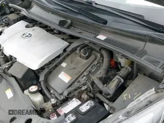 ✅ 2021 Toyota Prius L Eco • VIN: JTDKAMFU1M3147715 • Лот: 42053123. Опубликован ранее на IAAI с пробегом 126 398 миль. Бесплатный доступ к архиву аукционных продаж из США и подробный отчёт об истории автомобиля на DreamBid. Изображение 18.