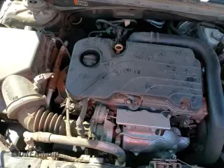 2019 Chevrolet Malibu LS z VIN 1G1ZB5STXKF199556, wystawiony jako Copart lot #80493745 z przebiegiem 88 485 mil mil oraz Szkoda całkowita • Salvage title. Historia ofert i sprzedaży dostępna na DreamBid. Obrazek 13.