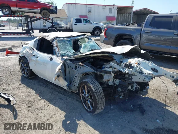 ✅ 2022 Mazda MX-5 Miata Grand Touring • VIN: JM1NDAM74N0503948 • Lot: 42124239. Wystawiony na IAAI z przebiegiem 50 068 mil. Bezpłatny archiwum sprzedaży aukcyjnych z USA i szczegółowy raport historii pojazdu na DreamBid. Zdjęcie 1.