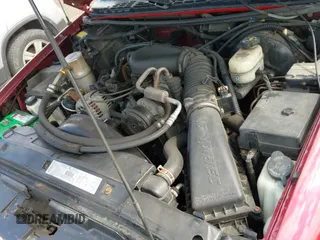 2001 Chevrolet Blazer LT z VIN 1GNDT13W11K266056, wystawiony jako IAAI lot #42171109 z przebiegiem 144 557 mil mil oraz . Historia ofert i sprzedaży dostępna na DreamBid. Obrazek 12.