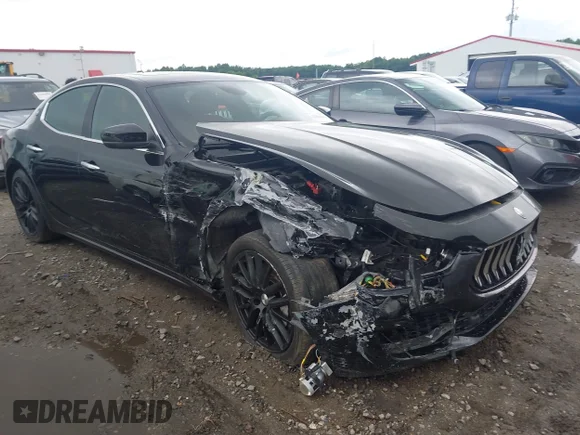 ✅ 2020 Maserati Ghibli • VIN: ZAM57XSA6L1356673 • Lot: 42388438. Listed on IAAI with 79,945 mi. Free auction sales archive from the USA and detailed vehicle history report at DreamBid. Image 1.