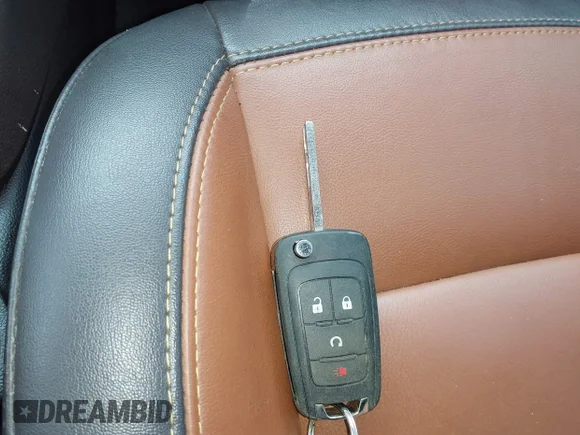 ✅ 2016 Buick Encore Premium • VIN: KL4CJDSB3GB607132 • Lot: 41526249. Listed on IAAI with 50,617 mi. Free auction sales archive from the USA and detailed vehicle history report at DreamBid. Image 11.