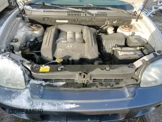 2005 Hyundai Santa Fe GLS z VIN KM8SC13D65U926600, wystawiony jako Copart lot #85378354 z przebiegiem 86 781 mil mil oraz Czysty tytuł • Clean title. Historia ofert i sprzedaży dostępna na DreamBid. Obrazek 13.