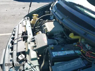 ✅ 1999 Plymouth Voyager • VIN: 2P4FP2536XR443320 • Lot: 43102161. Listed on IAAI with 156,591 mi. Free auction sales archive from the USA and detailed vehicle history report at DreamBid. Image 12.