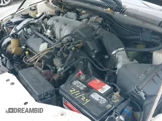 ✅ 1996 Mercury Sable GS • VIN: 1MELM50U4TG650767 • Lot: 42673567. Wystawiony na IAAI z przebiegiem 179 981 mil. Bezpłatny archiwum sprzedaży aukcyjnych z USA i szczegółowy raport historii pojazdu na DreamBid. Zdjęcie 14.