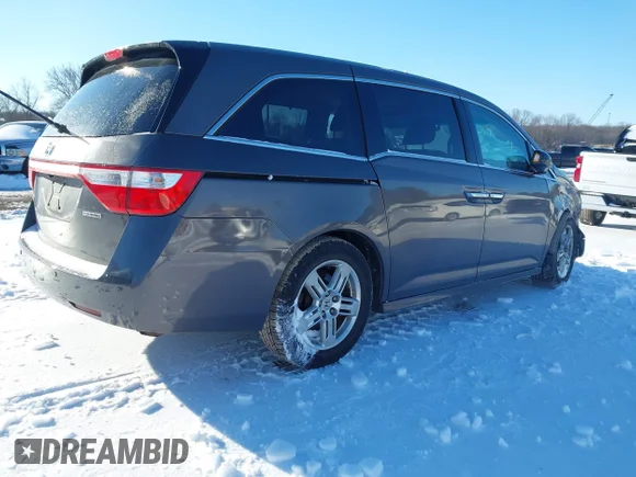 ✅ 2011 Honda Odyssey Touring • VIN: 5FNRL5H97BB102382 • Lot: 44167440. Listed on IAAI with 146,902 mi. Free auction sales archive from the USA and detailed vehicle history report at DreamBid. Image 4.