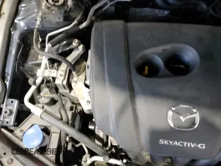 ✅ 2022 Mazda 3 S • VIN: JM1BPAJL9N1519522 • Лот: 81258885. Опубликован ранее на Copart с пробегом 61 546 миль. Бесплатный доступ к архиву аукционных продаж из США и подробный отчёт об истории автомобиля на DreamBid. Изображение 13.