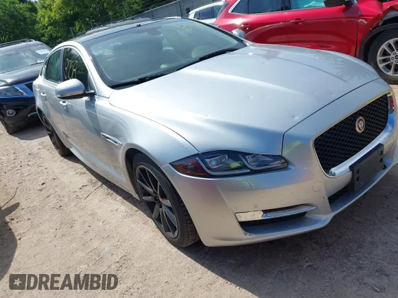 ✅ 2016 Jaguar XJ R-Sport • VIN: SAJWA1C7XG8W02813 • Lot: 42508758. Listed on IAAI with 102,919 mi. Free auction sales archive from the USA and detailed vehicle history report at DreamBid. Image 1.