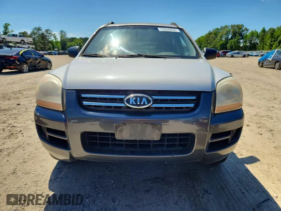 ✅ 2007 Kia Sportage EX • VIN: KNDJE723977331716 • Lot: 53826836. Wystawiony na Copart z przebiegiem 113 143 mil. Bezpłatny archiwum sprzedaży aukcyjnych z USA i szczegółowy raport historii pojazdu na DreamBid. Zdjęcie 5.