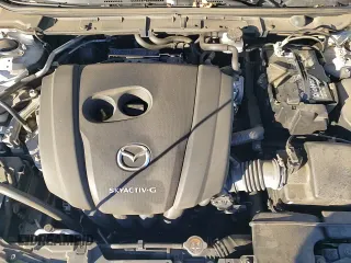 ✅ 2019 Mazda 3 • VIN: JM1BPBJM8K1122670 • Лот: 90996435. Опубликован ранее на Copart с пробегом 118 472 миль. Бесплатный доступ к архиву аукционных продаж из США и подробный отчёт об истории автомобиля на DreamBid. Изображение 16.