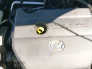 ✅ 2012 Mazda 3 i Touring • VIN: JM1BL1VG5C1506157 • Lot: 41629654. Listed on IAAI with 144,475 mi. Free auction sales archive from the USA and detailed vehicle history report at DreamBid. Image 13.