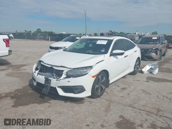 ✅ 2018 Honda Civic Touring • VIN: JHMFC1F99JX008764 • Lot: 44817868. Listed on IAAI with 70,021 mi. Free auction sales archive from the USA and detailed vehicle history report at DreamBid. Image 2.