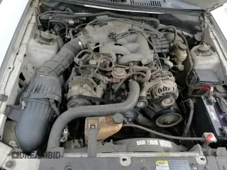 ✅ 2004 Ford Mustang Deluxe • VIN: 1FAFP44454F123067 • Lot: 86784474. Listed on Copart with 161,541 mi. Free auction sales archive from the USA and detailed vehicle history report at DreamBid. Image 13.