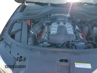 ✅ 2014 Audi A8 3.0T • VIN: WAURGAFD5EN005771 • Лот: 63796305. Опубликован ранее на Copart с пробегом 116 713 миль. Бесплатный доступ к архиву аукционных продаж из США и подробный отчёт об истории автомобиля на DreamBid. Изображение 15.