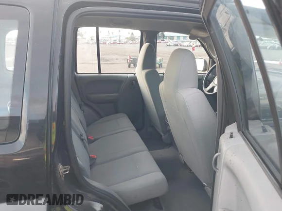 ✅ 2006 Jeep Liberty Sport • VIN: 1J4GL48K36W211521 • Lot: 44061262. Listed on IAAI with 142,431 mi. Free auction sales archive from the USA and detailed vehicle history report at DreamBid. Image 8.