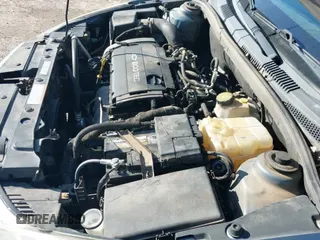 2012 Chevrolet Cruze LS z VIN 1G1PC5SH4C7299339, wystawiony jako IAAI lot #43442779 z przebiegiem 197 467 mil mil oraz . Historia ofert i sprzedaży dostępna na DreamBid. Obrazek 12.