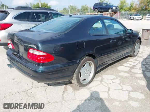 ✅ 2002 Mercedes-Benz CLK 55 AMG • VIN: WDBLJ74G32T109997 • Lot: 43125679. Listed on IAAI with 245,493 mi. Free auction sales archive from the USA and detailed vehicle history report at DreamBid. Image 4.