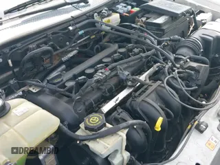 ✅ 2007 Ford Focus S • VIN: 1FAFP31N57W149096 • Lot: 41746595. Wystawiony na IAAI z przebiegiem 166 458 mil. Bezpłatny archiwum sprzedaży aukcyjnych z USA i szczegółowy raport historii pojazdu na DreamBid. Zdjęcie 12.