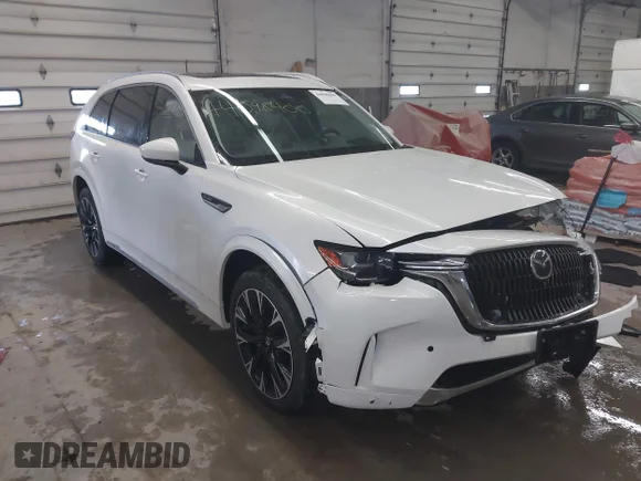 ✅ 2024 Mazda CX-90 S Premium Plus • VIN: JM3KKEHC2R1142993 • Lot: 44098400. Listed on IAAI with 26,492 mi. Free auction sales archive from the USA and detailed vehicle history report at DreamBid. Image 1.