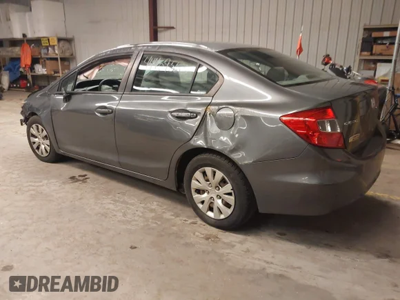 ✅ 2012 Honda Civic LX • VIN: 19XFB2F50CE373974 • Lot: 44409563. Listed on IAAI with 146,036 mi. Free auction sales archive from the USA and detailed vehicle history report at DreamBid. Image 3.