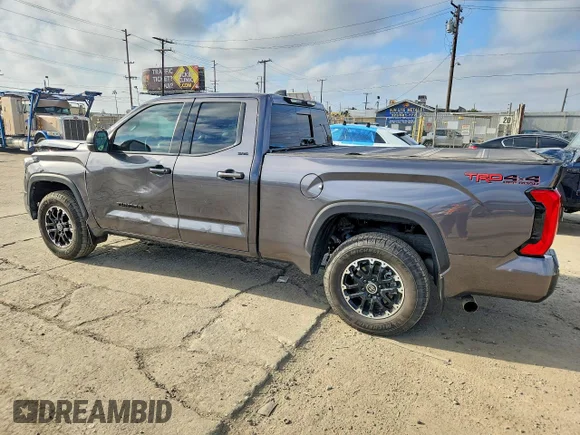 ✅ 2023 Toyota Tundra SR5 • VIN: 5TFLA5DA7PX128392 • Лот: 61622506. Опубликован ранее на Copart с пробегом 16 091 миль. Бесплатный доступ к архиву аукционных продаж из США и подробный отчёт об истории автомобиля на DreamBid. Изображение 2.
