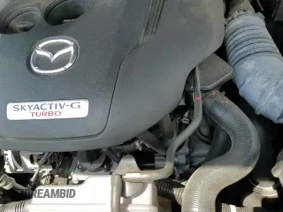 ✅ 2021 Mazda CX-5 Carbon Edition • VIN: JM3KFACY9M0382864 • Лот: 66646065. Опубликован ранее на Copart с пробегом 40 622 миль. Бесплатный доступ к архиву аукционных продаж из США и подробный отчёт об истории автомобиля на DreamBid. Изображение 14.