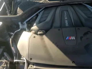 ✅ 2018 BMW X5 M • VIN: 5YMKT6C58J0Y83672 • Lot: 48067795. Listed on Copart with 61,554 mi. Free auction sales archive from the USA and detailed vehicle history report at DreamBid. Image 14.