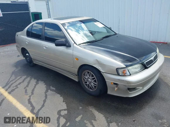 ✅ 1999 Infiniti G20 • VIN: JNKCP11A5XT003361 • Lot: 42512552. Listed on IAAI with 169,388 mi. Free auction sales archive from the USA and detailed vehicle history report at DreamBid. Image 1.